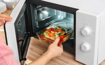 Can you stand in front of a microwave while cooking and is it safe?